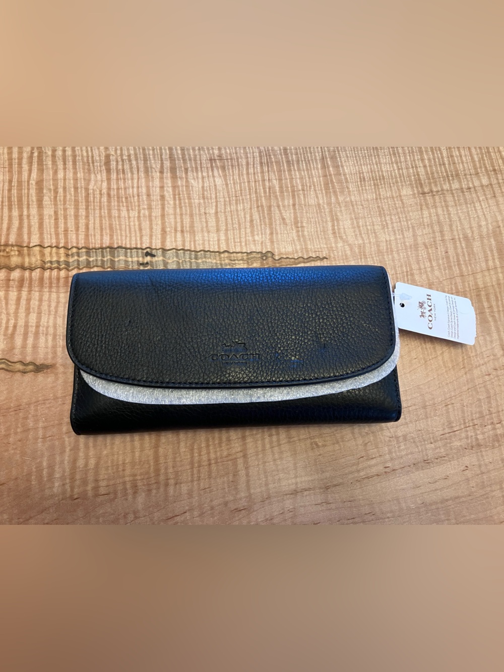 Coach black pebble leather slim wallet